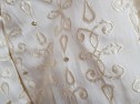Gold embroidery detail on bridesmaid bolero